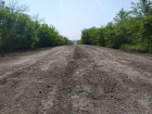 Разбитую дорогу в ЛНР начали ремонтировать строители из Воронежской области